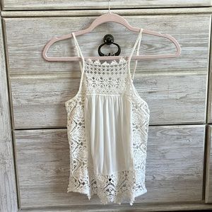 White tank top from Aeropostale with small ties on the side, size XS.